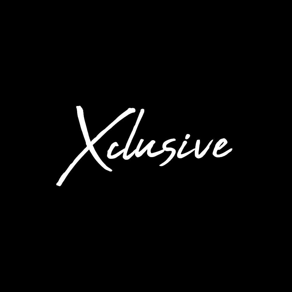 Xclusive cover
